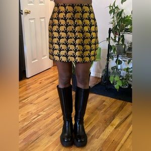 Gold elephant print mini skirt